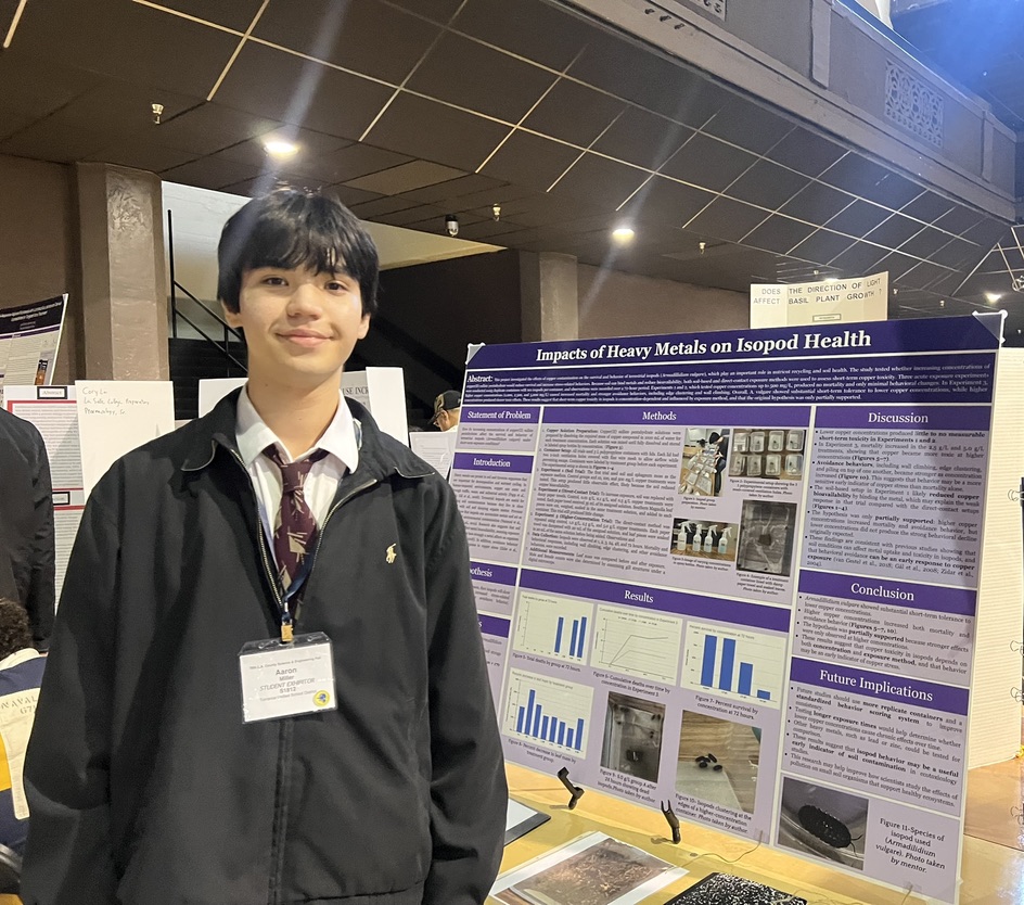 Aaron Miller stands by his research table at the LA County Science Fair 2026
